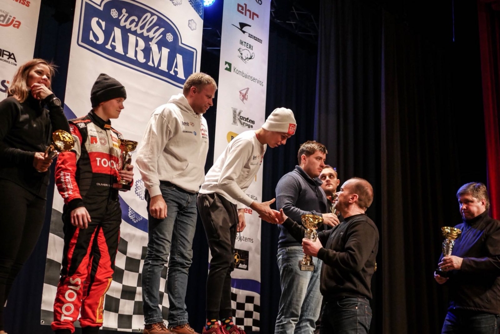 Gulbenes novadā aizvadīts šīs sezonas sniegotākais un aukstākais Latvijas rallija posms - “Rallijs Sarma 2018”, kuru LMT Autosporta Akadēmijas ekipāža Mārtiņš Sesks un Renārs Francis paveica kā visātrākā vienas ass piedziņas ekipāža, izcīnot uzvaru Latvijas rallija čempionāta ieskaitē LRC3 klasē.
Autors: Dāvids Kokainis
